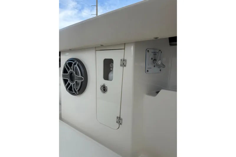  Yacht Photos Pics 2023 Solace 32 CS boat interior with speaker and control panel.