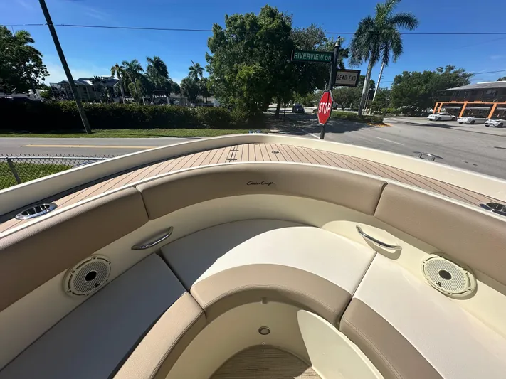  Yacht Photos Pics 2024 Chris-Craft Catalina 30 boat interior with beige seating and teak deck.