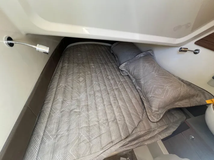  Yacht Photos Pics 2024 Chris-Craft Catalina 30 cabin bed with modern bedding.