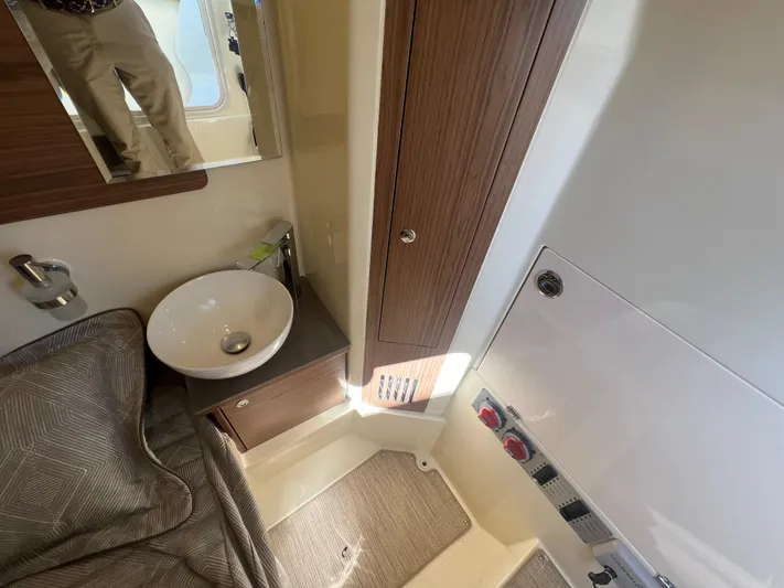  Yacht Photos Pics 2024 Chris-Craft Catalina 30 interior cabin with sink and storage.