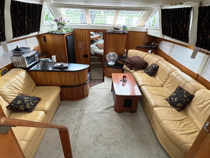  Yacht Photos Pics Luxurious interior of a 2001 Carver 444 Cockpit Motor Yacht with leather seating.