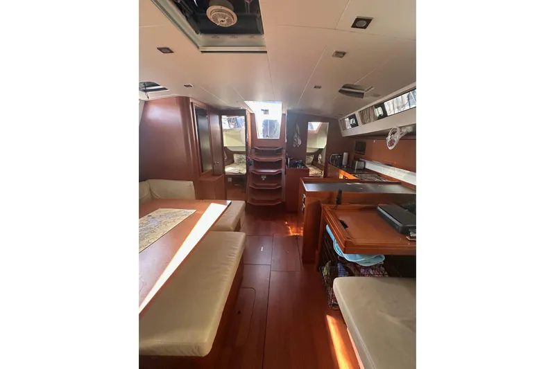  Yacht Photos Pics Interior of 2014 Beneteau Oceanis 48 yacht, featuring spacious seating and modern amenities.