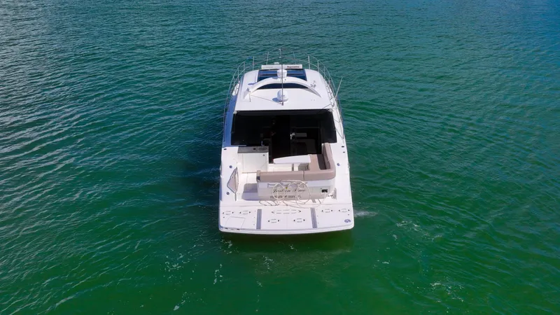 Just In Time Yacht Photos Pics 2016 Sea Ray 470 Sundancer yacht on open water, aerial view.