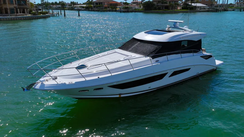 Just In Time Yacht Photos Pics 2016 Sea Ray 470 Sundancer yacht on clear blue water.