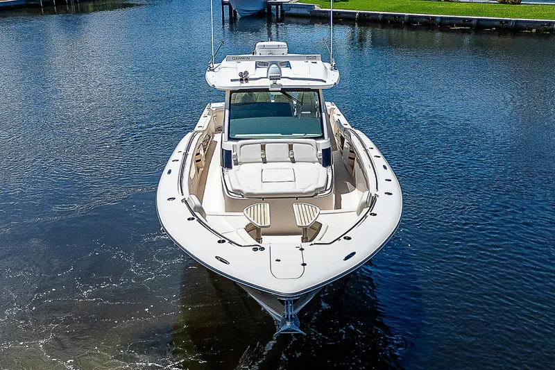  Yacht Photos Pics 2019 Grady-White Canyon 456 boat on calm water.