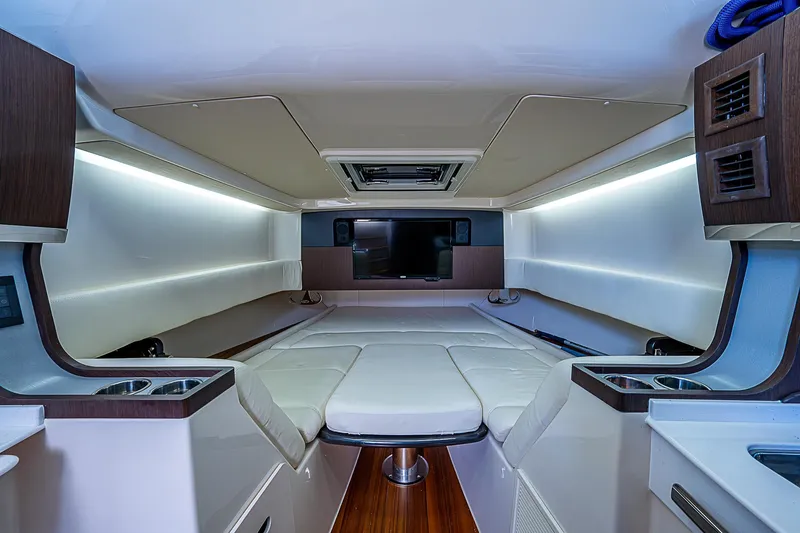  Yacht Photos Pics Luxurious interior cabin of 2019 Grady-White Canyon 456 boat with modern amenities.