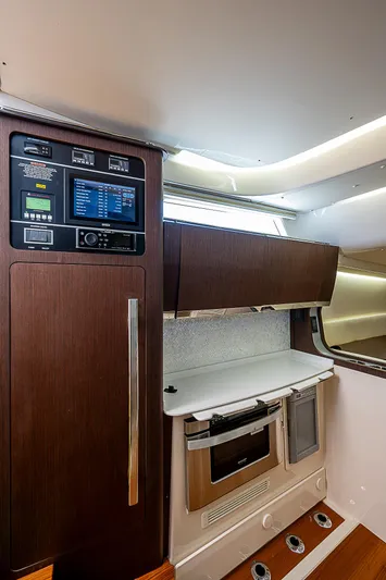  Yacht Photos Pics 2019 Grady-White Canyon 456 interior kitchen with modern appliances.