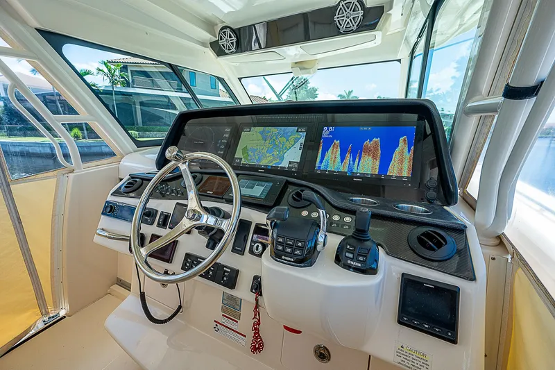  Yacht Photos Pics 2019 Grady-White Canyon 456 helm with advanced navigation and control systems.