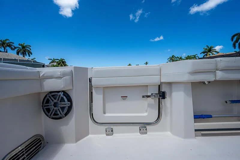  Yacht Photos Pics 2019 Grady-White Canyon 456 boat interior with seating and storage compartment.