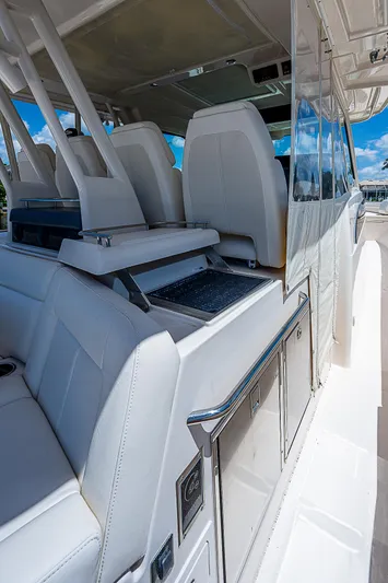  Yacht Photos Pics 2019 Grady-White Canyon 456 boat interior with white leather seats.