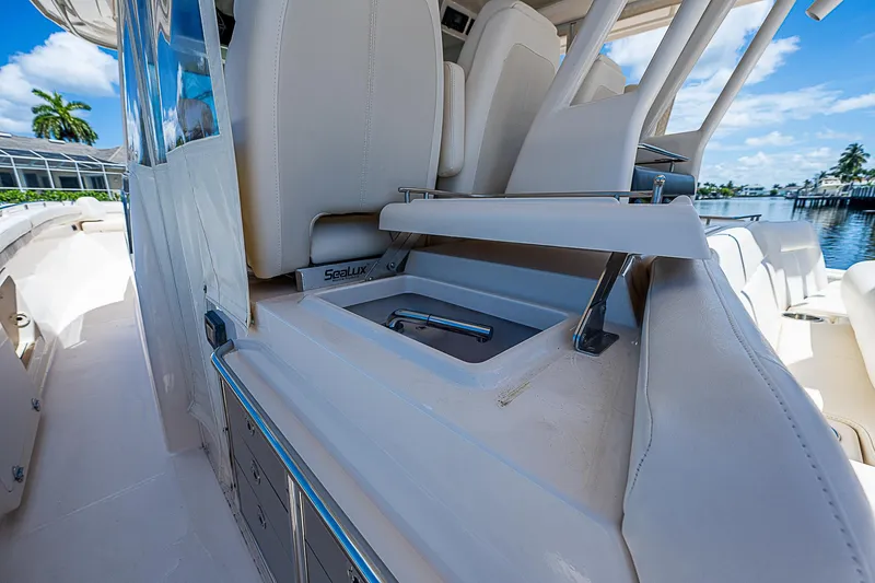  Yacht Photos Pics 2019 Grady-White Canyon 456 boat interior with seating and storage compartments.
