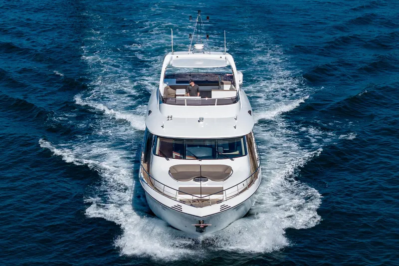  Yacht Photos Pics 2023 Massimo Marine 72' Flybridge Motor Yacht cruising on open water.