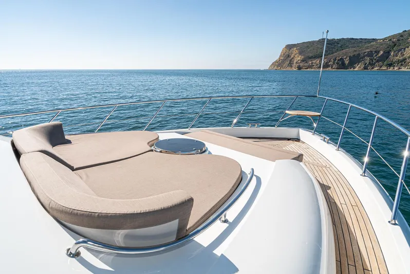  Yacht Photos Pics Luxurious 2023 Massimo Marine 72' Flybridge Motor Yacht on serene ocean waters.