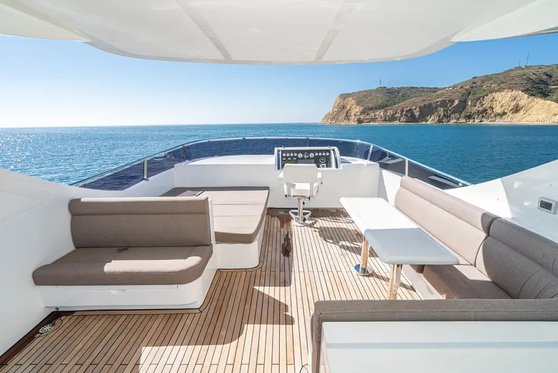  Yacht Photos Pics Luxurious 2023 Massimo Marine 72' Flybridge Motor Yacht with spacious deck and scenic ocean view.