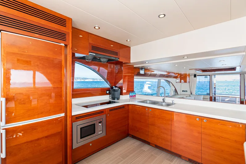  Yacht Photos Pics Luxurious kitchen interior of 2023 Massimo Marine 72' Flybridge Motor Yacht.