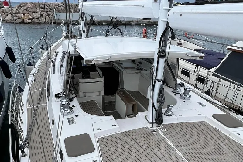  Yacht Photos Pics Luxury Amel 64 yacht, 2016 model, docked at marina with sleek deck design.