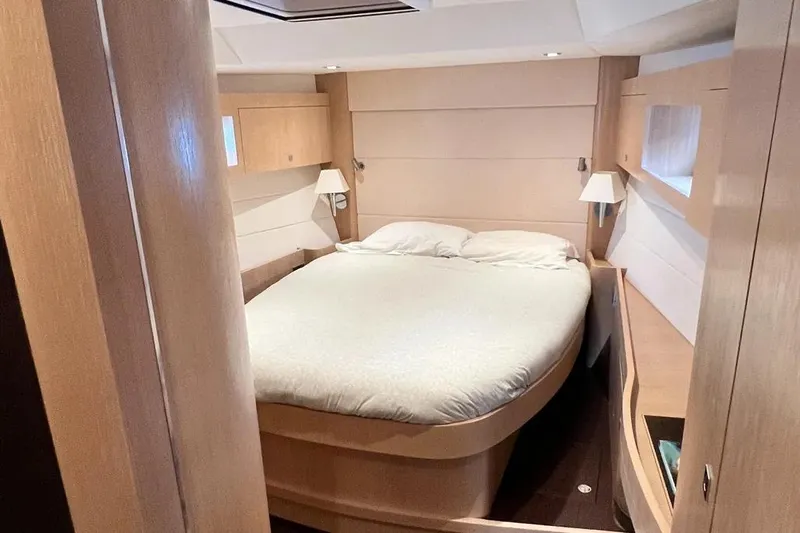  Yacht Photos Pics Luxurious cabin interior of 2016 Amel 64 yacht with cozy double bed.