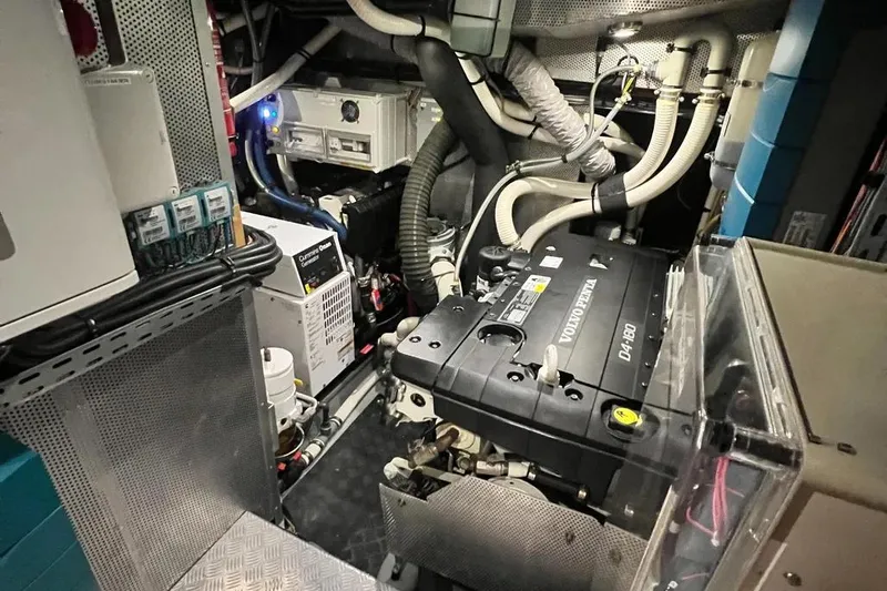  Yacht Photos Pics Engine room of a 2016 Amel 64 yacht, featuring a Volvo Penta D4-180 engine.