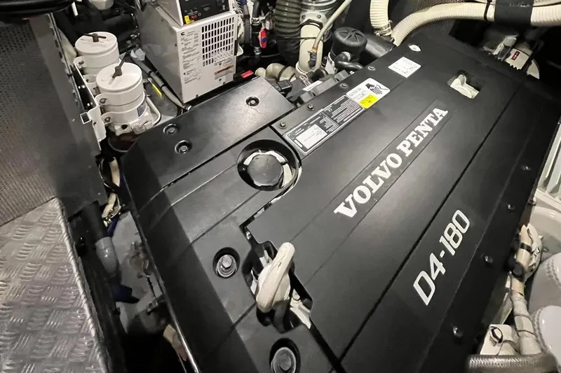  Yacht Photos Pics Engine room of a 2016 Amel 64 yacht featuring a Volvo Penta D4-180 engine.