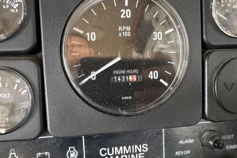 William B Yacht Photos Pics Tachometer and engine hours display on 2003 American Tug 34 boat dashboard.