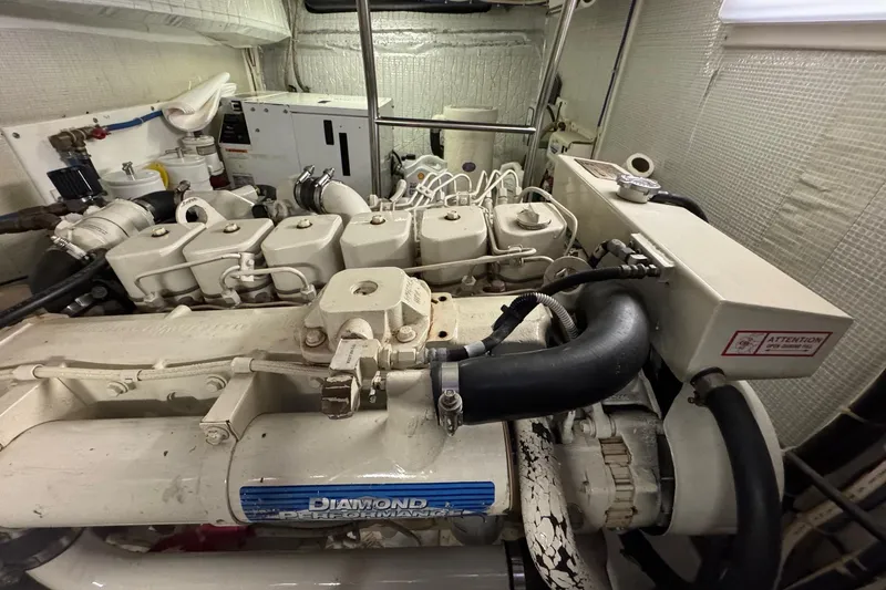 William B Yacht Photos Pics Engine room of 2003 American Tug 34, showcasing detailed mechanical components.