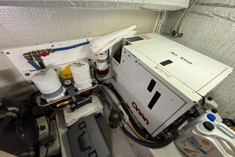 William B Yacht Photos Pics Engine room of 2003 American Tug 34 with Onan generator and fuel filters.