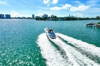 Princessita Yacht Photos Pics Azimut Atlantis 2014 yacht cruising on a sunny day in turquoise waters.