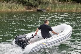 2022 ZAR Mini Rib 10 Lite inflatable boat on water with person steering.