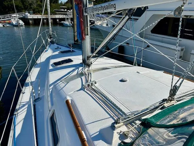 Golden Handcuffs Yacht Photos Pics 2007 Beneteau 373 sailboat deck view at marina.