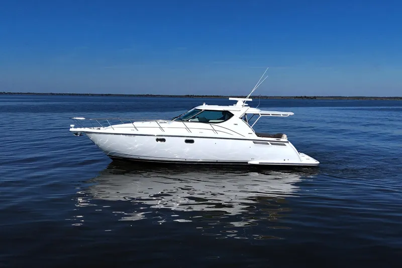 Chico Malo Yacht Photos Pics 2008 Tiara Yachts 4300 Sovran cruising on calm blue waters.