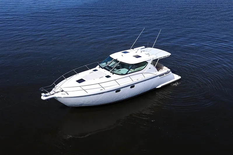 Chico Malo Yacht Photos Pics 2008 Tiara Yachts 4300 Sovran cruising on calm waters.