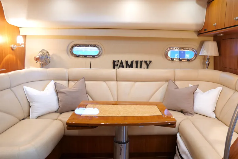 Chico Malo Yacht Photos Pics Luxurious interior of 2008 Tiara Yachts 4300 Sovran with plush seating and elegant decor.