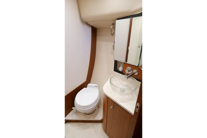 Chico Malo Yacht Photos Pics 2008 Tiara Yachts 4300 Sovran bathroom with modern fixtures and elegant design.