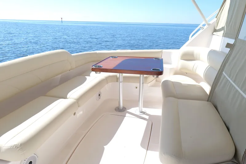 Chico Malo Yacht Photos Pics Luxurious seating area on 2008 Tiara Yachts 4300 Sovran, overlooking serene ocean view.