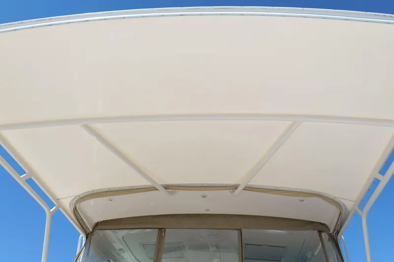 Chico Malo Yacht Photos Pics 2008 Tiara Yachts 4300 Sovran hardtop against clear blue sky.