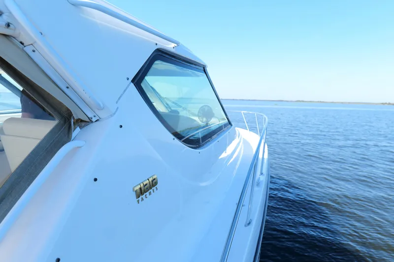 Chico Malo Yacht Photos Pics 2008 Tiara Yachts 4300 Sovran cruising on calm blue waters.