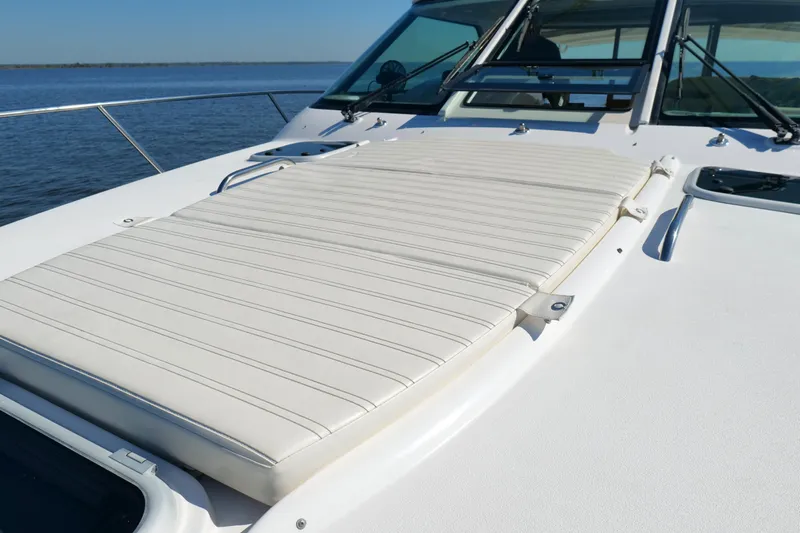 Chico Malo Yacht Photos Pics 2008 Tiara Yachts 4300 Sovran deck with cushioned sunpad, ocean view.