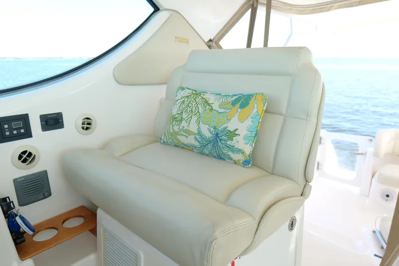 Chico Malo Yacht Photos Pics Luxurious 2008 Tiara Yachts 4300 Sovran interior with plush seating and decorative pillow.