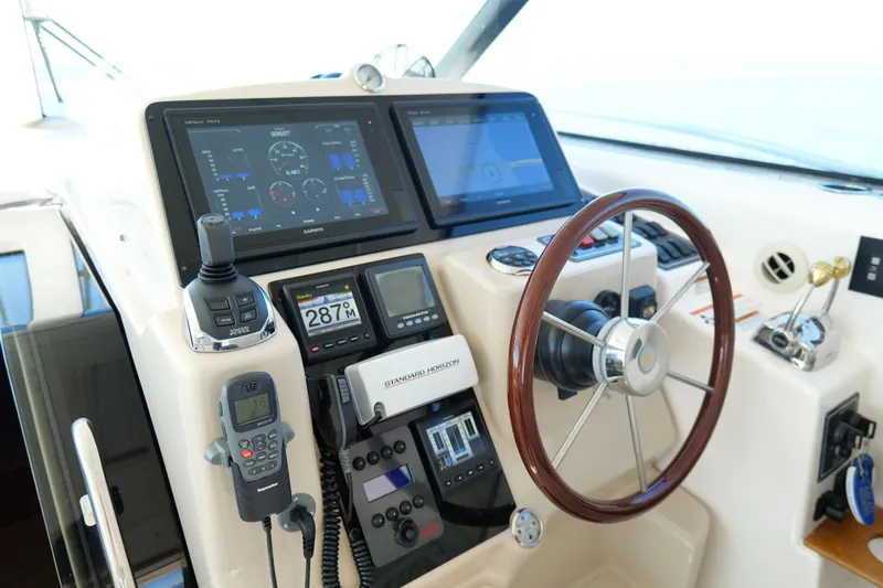 Chico Malo Yacht Photos Pics 2008 Tiara Yachts 4300 Sovran helm with advanced navigation and control systems.