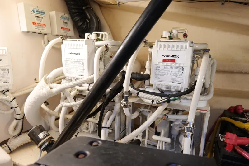 Chico Malo Yacht Photos Pics Engine room of 2008 Tiara Yachts 4300 Sovran with Dometic systems and wiring.
