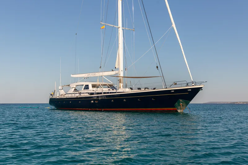 Unplugged Yacht Photos Pics Sailing yacht Valdettaro 112 from 1993 on calm blue waters.