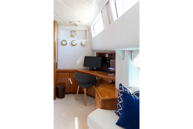 Unplugged Yacht Photos Pics Luxurious Valdettaro 112 yacht interior with desk, chair, and nautical decor, built in 1993.