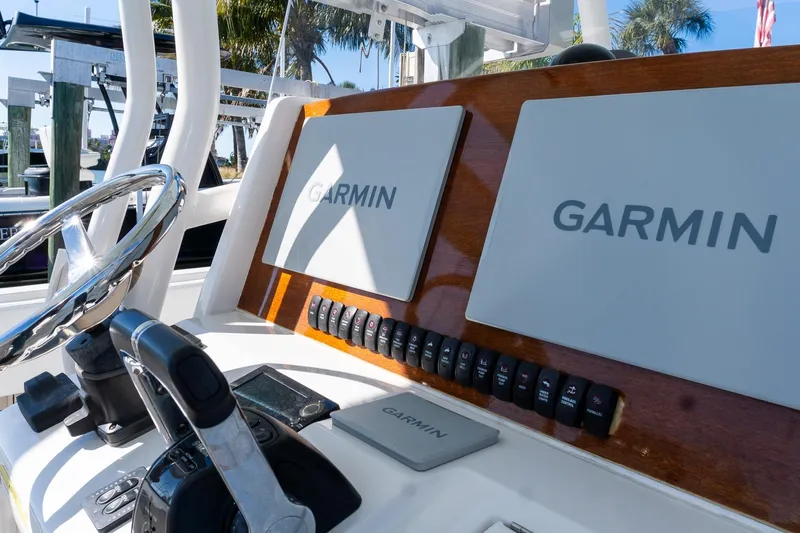  Yacht Photos Pics 2013 Jupiter 34 FS boat dashboard with Garmin navigation displays and controls.