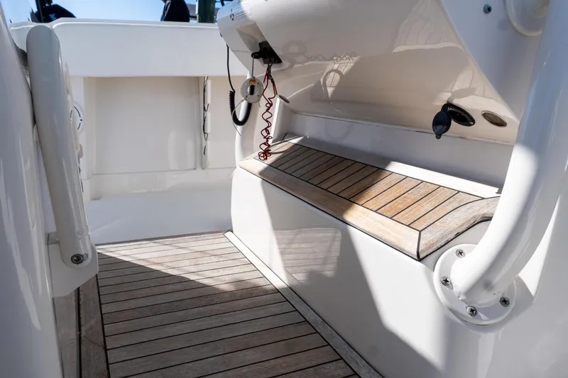  Yacht Photos Pics 2013 Jupiter 34 FS boat interior with wooden deck and seating area.