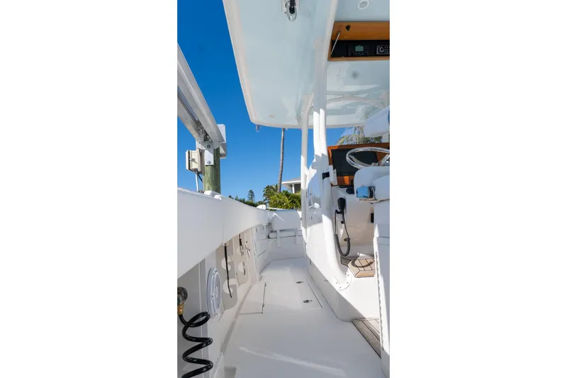  Yacht Photos Pics 2013 Jupiter 34 FS boat interior with white deck and clear blue sky.