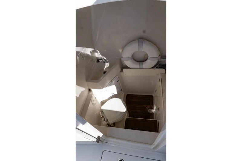  Yacht Photos Pics 2013 Jupiter 34 FS boat interior with toilet and life preserver.