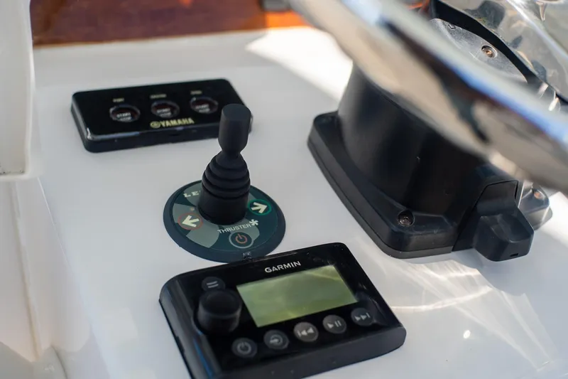  Yacht Photos Pics Control panel of 2013 Jupiter 34 FS boat with Garmin and Yamaha equipment.