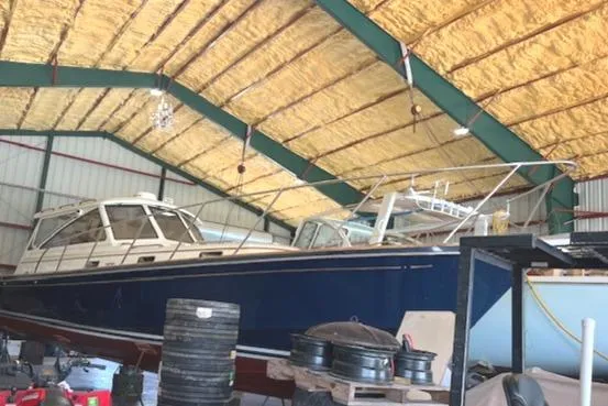 Daisy IV Yacht Photos Pics 2001 Little Harbor WhisperJet 44 boat stored in a spacious indoor facility.