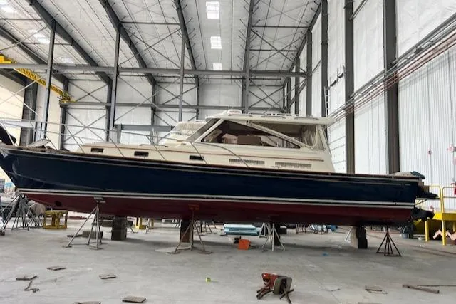 Daisy IV Yacht Photos Pics 2001 Little Harbor WhisperJet 44 yacht in a spacious indoor facility.