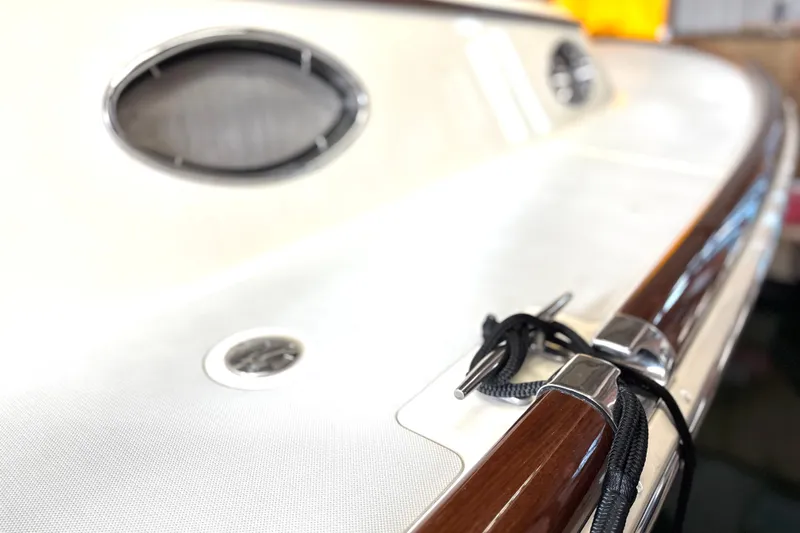 Flight Yacht Photos Pics Close-up of 2009 San Juan 48 yacht deck with polished wood and metal details.